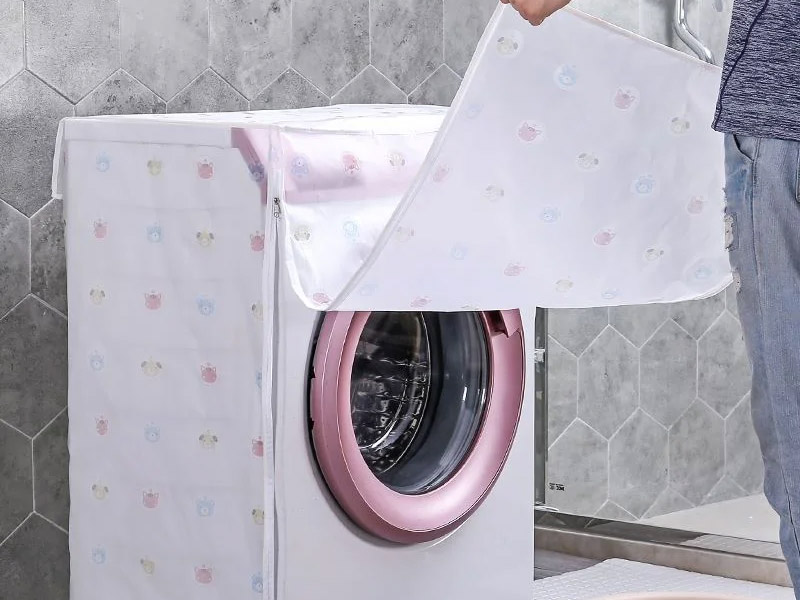 Sử dụng áo trùm máy giặt để bảo quản tốt hơn